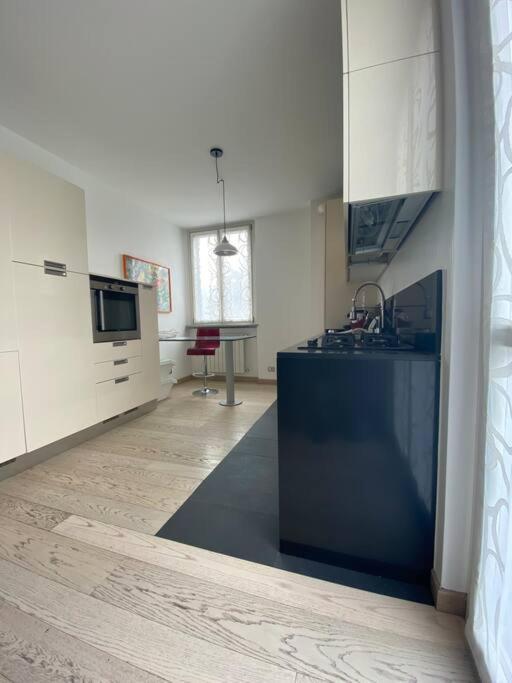 Appartement Maison Minu à Porto Ceresio Extérieur photo